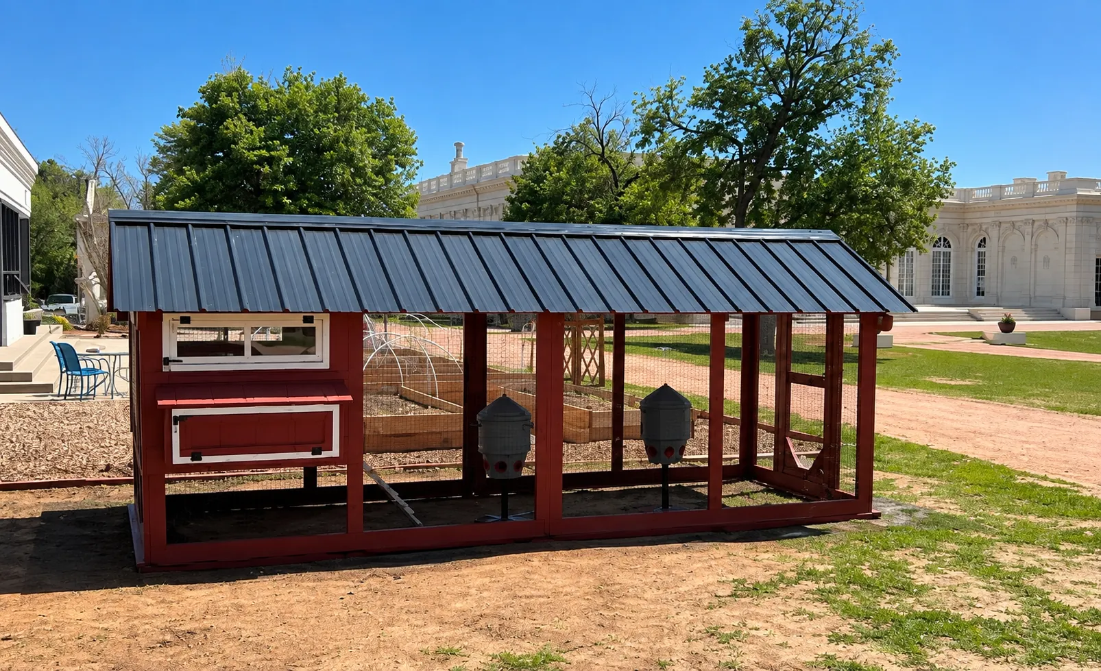 The new coop on campus with the school building behind it
